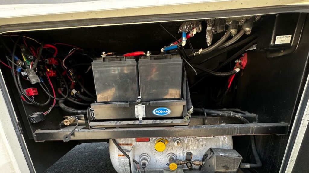 Old RV battery tray and batteries