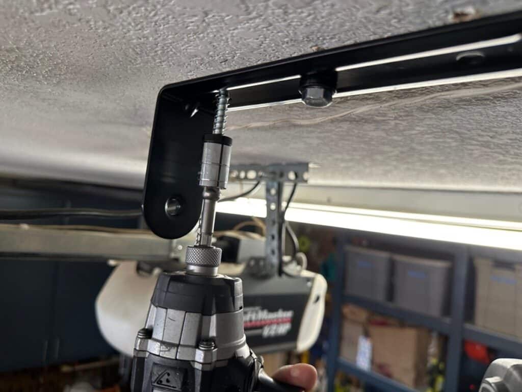 Retractable cord reel ceiling mount bracket install