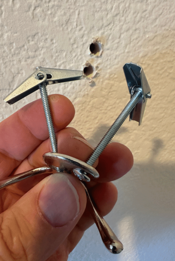 How to hang hooks on drywall - toggle bolt installation